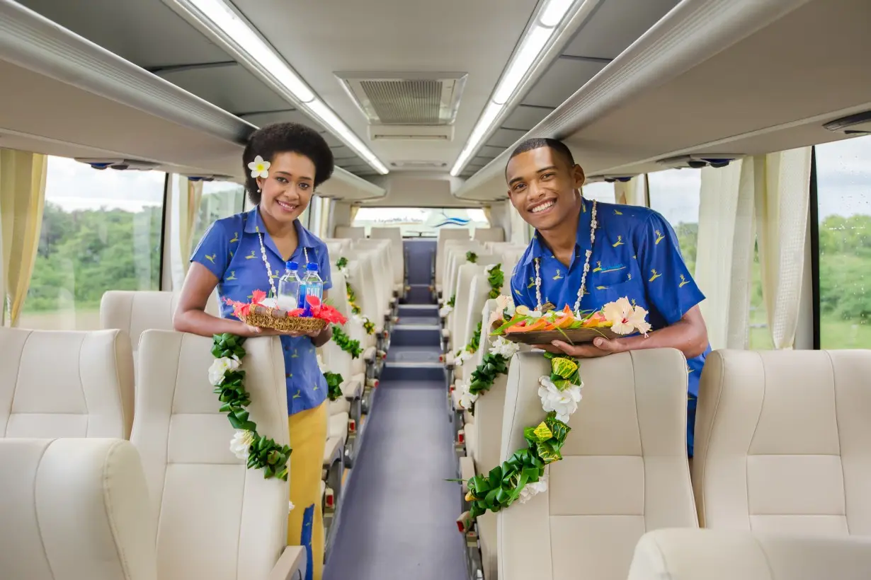 Guest welcome service aboard a Tour Managers coach